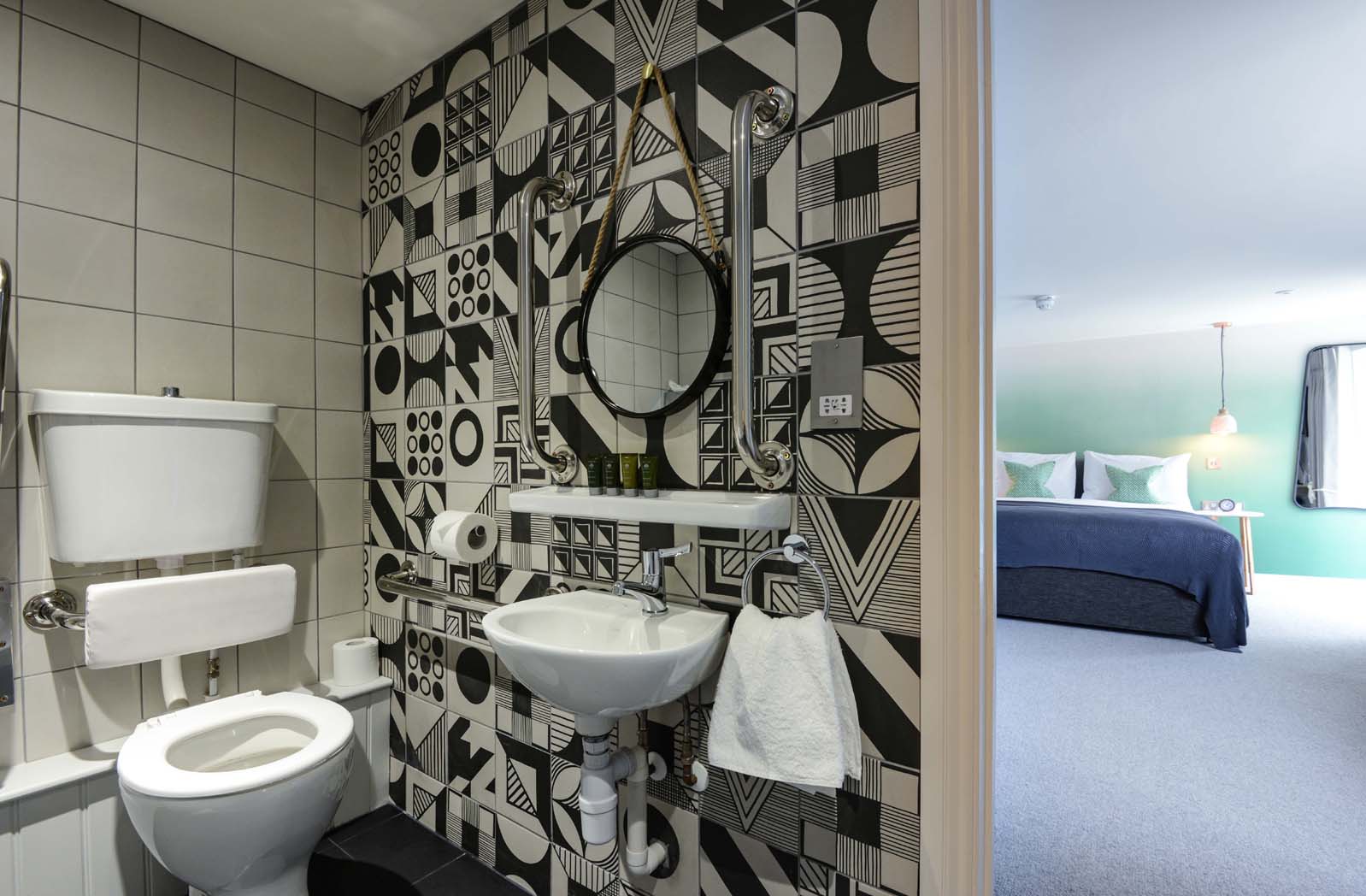 Oatfields - Black and white tiles in the disabled friendly wetroom bathroom